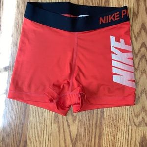 Orange NIKE PRO shorts